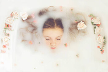 Illustration Caucasian teenage girl floating in milk
