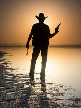 Stampa d'arte Silhouette of a man with cowboy
