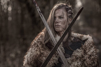 Umělecký tisk Sword wielding viking warrior young blond