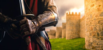 Fototapeta Medieval knight holding a sword with