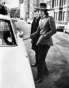 Obraz na plátně Jagger, singer with the Rolling Stones, about to get into his car, c.1970