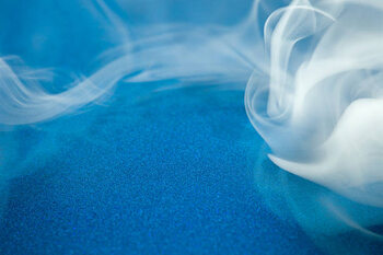 Obraz na plátně Blue Metallic Background with White Smoke