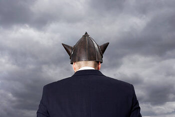 Plakát Man wearing metal 'Viking' helment, rear view