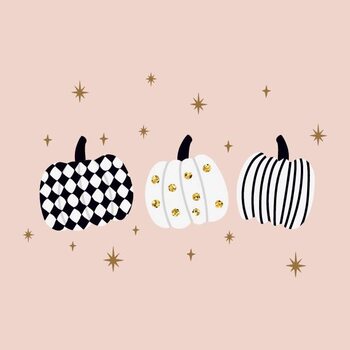 Tableau sur toile Three Halloween pumpkins with gold glitter.