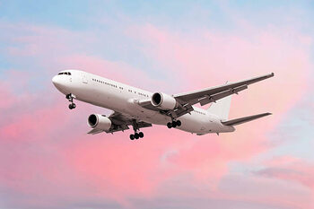 Tableau sur toile XXL jet airplane landing at dusk