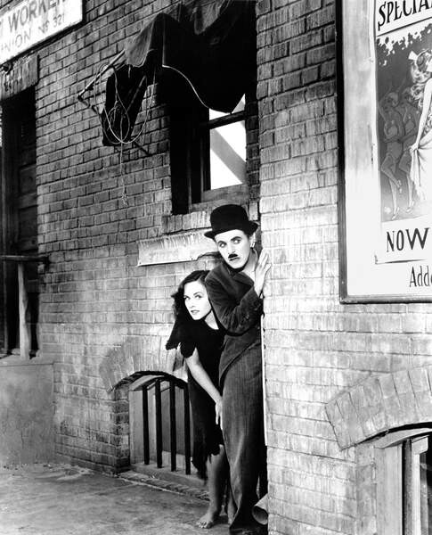 Fotografie Charlie Chaplin, Paulette Goddard, 1936, 35x40 cm