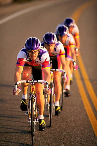 Levně Plakát, Obraz - Road racing cyclist team riding in, John P Kelly, 26.7 × 40 cm