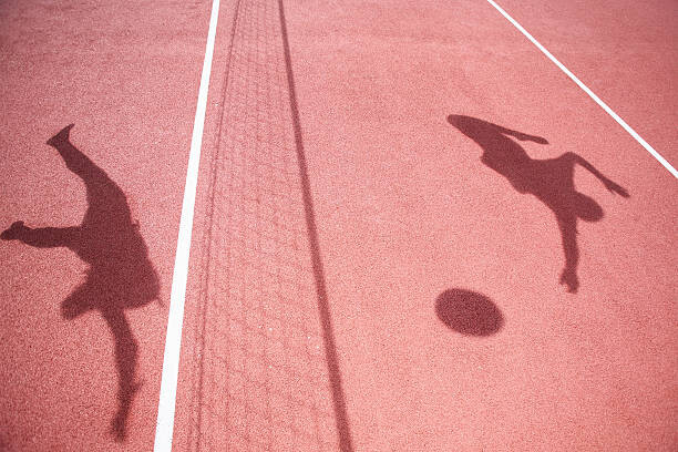 Levně Plakát, Obraz - Shadows of athletes playing volleyball, Stanislaw Pytel, 40 × 26.7 cm