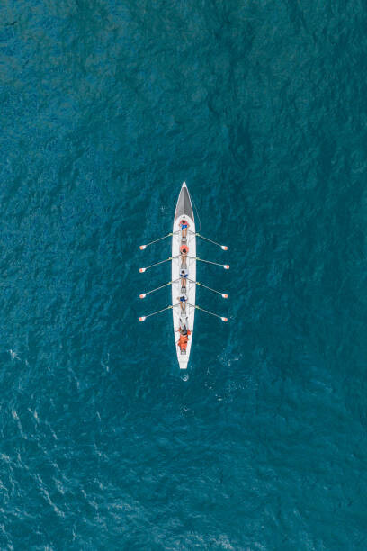 Umělecká fotografie Rowboat on the ocean as seen from above, France, Abstract Aerial Art, (26.7 x 40 cm)