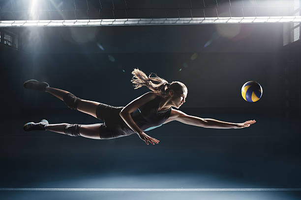 Levně Plakát, Obraz - Volleyball player jumping to the ball, Stanislaw Pytel, 40 × 26.7 cm