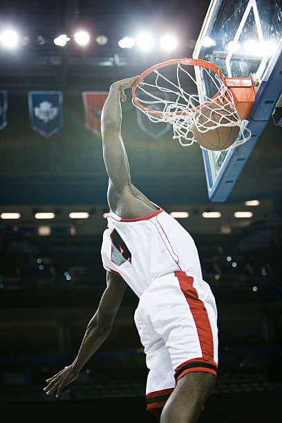 Plakát, Obraz - Basketball player slam dunking basketball, PhotoAlto/Sandro Di Carlo Darsa, 26.7 × 40 cm