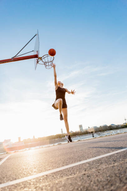 Levně Plakát, Obraz - Blonde woman playing basketball in Cologne,, Westend61, 26.7 × 40 cm