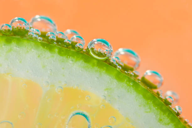 Levně Plakát, Obraz - Detail of a slice of lemon, Kryssia Campos, 40 × 26.7 cm