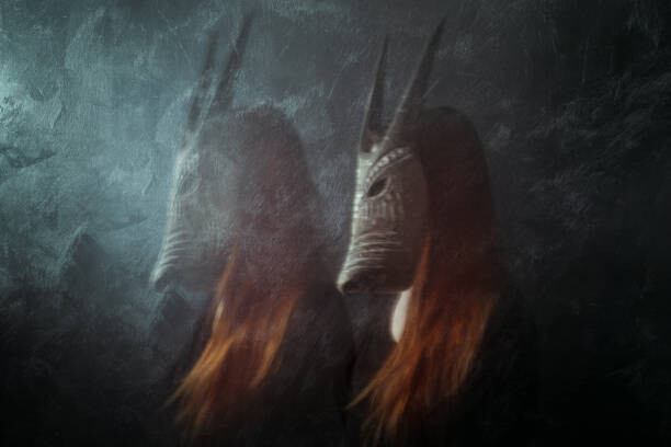 Levně Plakát, Obraz - Redhead woman wearing mask, long exposure, Martina Rigoli, 40 × 26.7 cm