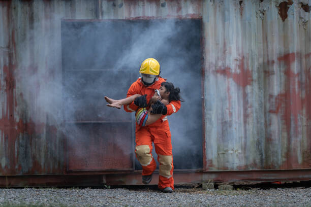 Levně Plakát, Obraz - Firefighter professionally rescue the victim on, Vithun Khamsong, 40 × 26.7 cm