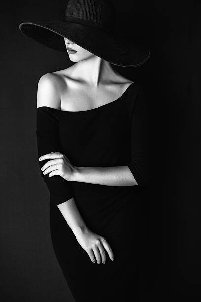 Levně Plakát, Obraz - Studio shot of young beautiful woman wearing hat, CoffeeAndMilk, 26.7 × 40 cm