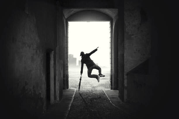 Levně Plakát, Obraz - happy man jumping happy despite the bad weather, francescoch, 40 × 26.7 cm