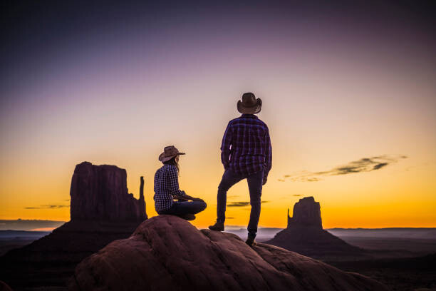 Ilustrace Hispanic couple admiring desert landscape at, Jacobs Stock Photography Ltd, 40 × 26.7 cm
