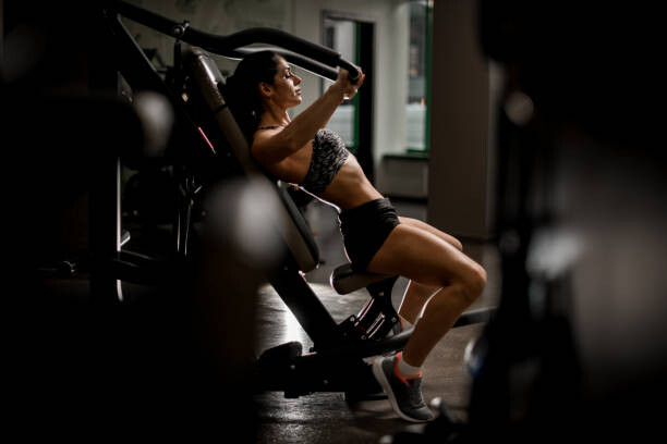 Fotografie View of sportive woman doing exercises, MaximFesenko, 40x26.7 cm