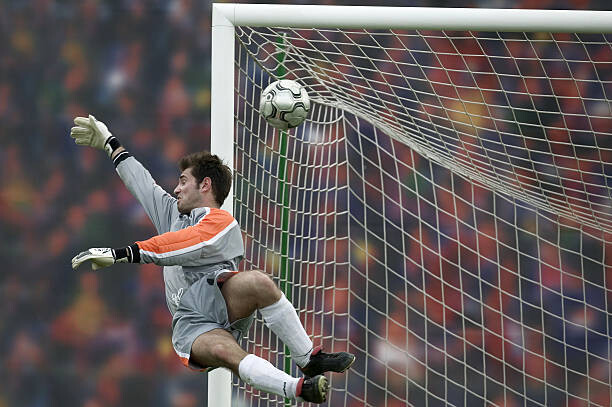 Fotografie Male football goalie trying to block goal in air, Photo and Co, 40 × 26.7 cm