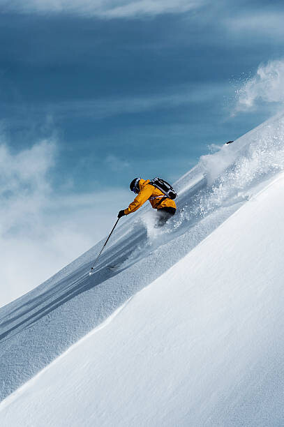 Levně Plakát, Obraz - Mid adult male skier speeding downhill,, Ross Woodhall, 26.7 × 40 cm
