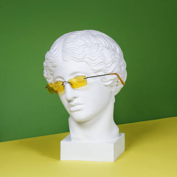 Levně Plakát, Obraz - Plaster head with yellow sunglasses, lambada, 40 × 40 cm