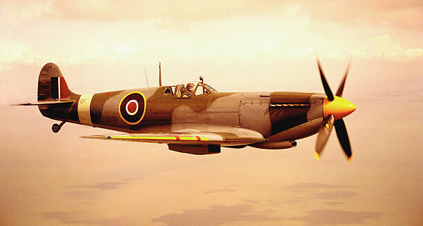 Fotografie Spitfire aircraft in flight (sepia tone), Michael Dunning, 40x22.5 cm