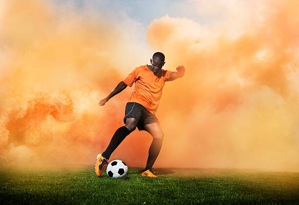 Plakát, Obraz - football player in orange smoke, Henrik Sorensen, 40 × 26.7 cm