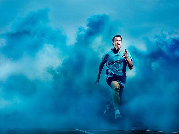 Plakát, Obraz - athlete running in blue smoke, Henrik Sorensen, 40 × 30 cm