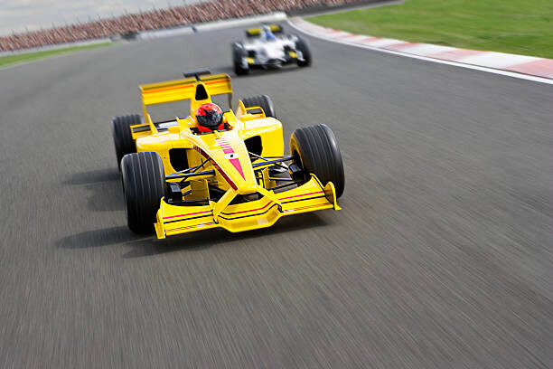 Levně Plakát, Obraz - Two open-wheel single-seater racing car Racecars, David Madison, 40 × 26.7 cm