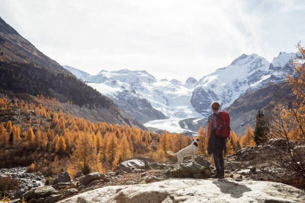 Levně Plakát, Obraz - Solo traveller hiking in Switzerland, Brigitte Blättler, 40 × 26.7 cm