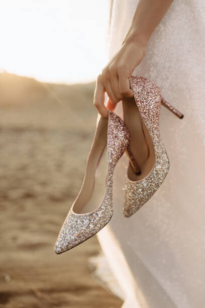 Levně Plakát, Obraz - Luxurious high-heeled shoes in the bride's, DAMIENPHOTO, 26.7 × 40 cm