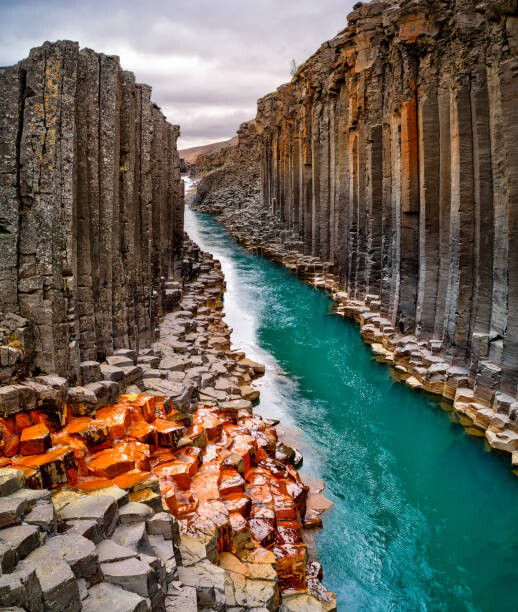 Levně Plakát, Obraz - Breathtaking view of Studlagil basalt canyon,, Kesu01, 33.9 × 40 cm