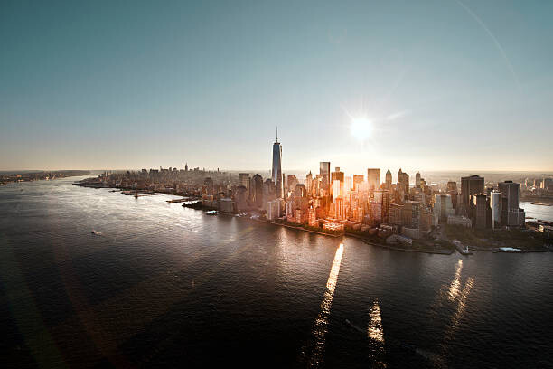Levně Plakát, Obraz - Aerial of Manhattan, NYC at sunrise, Howard Kingsnorth, 40 × 26.7 cm
