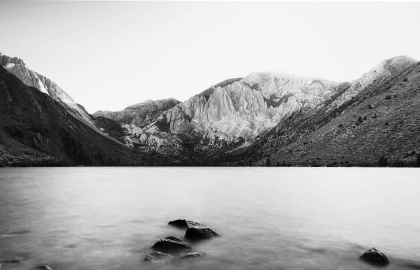 Levně Plakát, Obraz - Scenic view of lake and mountains, Yubo Qin / 500px, 40 × 26.7 cm