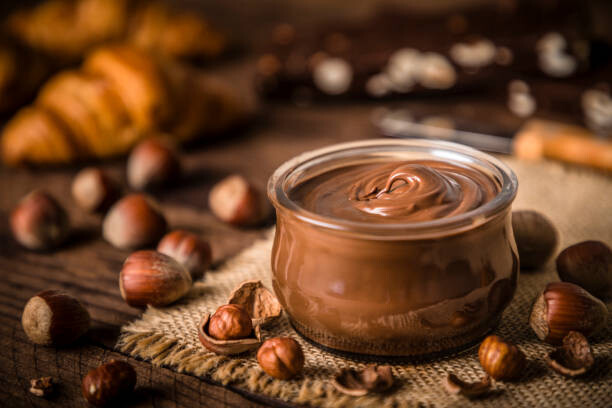 Plakát, Obraz - Crystal jar full of hazelnut and chocolate spread, carlosgaw, 40 × 26.7 cm