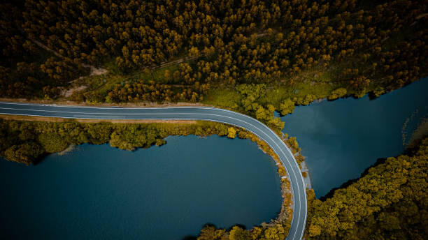 Fotografie WINDING MOUNTAIN ROAD WITH LAKE FROM, Gonsajo, 40x22.5 cm