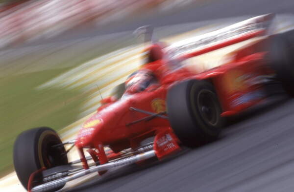 Fotografie Michael Schumacher in a Ferrari F310B at the Brazilian GP, Sao Paulo, Brazil, 1997, 40x26.7 cm