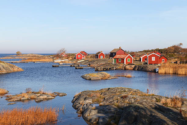 Fotografie Small cottages in autumn i archipelago, Anders Sellin, 40x26.7 cm