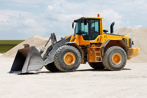 Ilustrace Yellow front loader at gravel pits, jordan_rusev, 40 × 26.7 cm