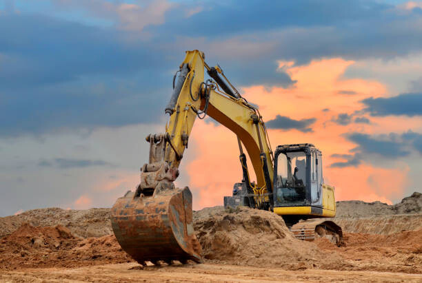 Ilustrace Excavator working on earthmoving at open, Maksim Safaniuk, 40 × 26.7 cm