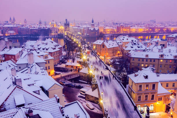 Levně Plakát, Obraz - Winter in Prague - city panorama, Henryk Sadura, 40 × 26.7 cm