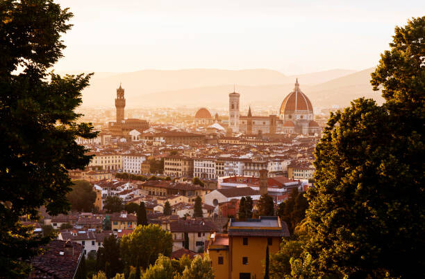 Levně Plakát, Obraz - Elevated view over the city of Florence at sunset, Gary Yeowell, 40 × 26.7 cm