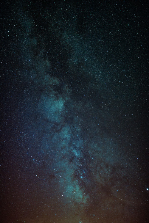 Photographie d'art Astrophotography of Orange-Blue Milky Way.