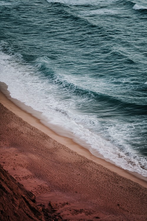 Arte fotográfico Empty red beach at sunset