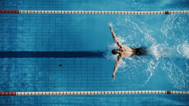 Художествена фотография Aerial Top View Male Swimmer Swimming