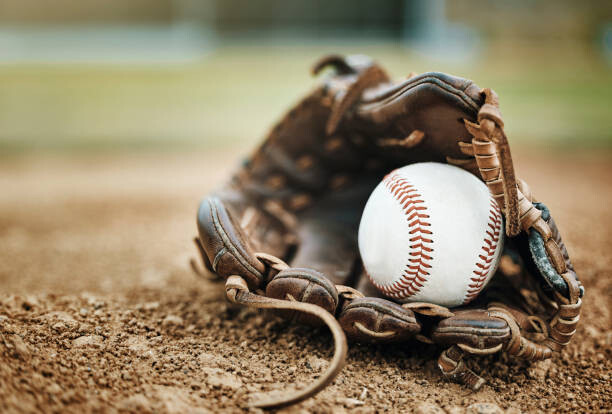 Художествена фотография Baseball, leather glove and ball on