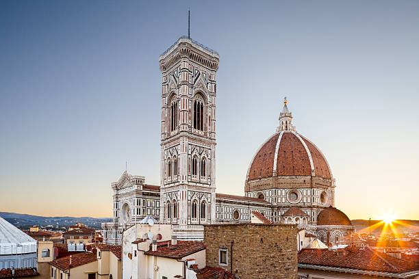 Umělecká fotografie Dawn breaks over the Duomo or Florence cathedral.