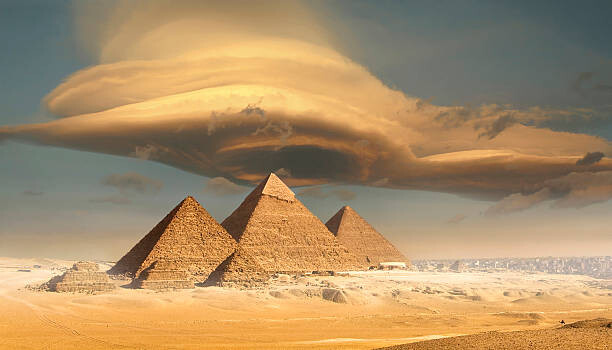 Художествена фотография Dramatic storm cloud above pyramids, Giza, Egypt