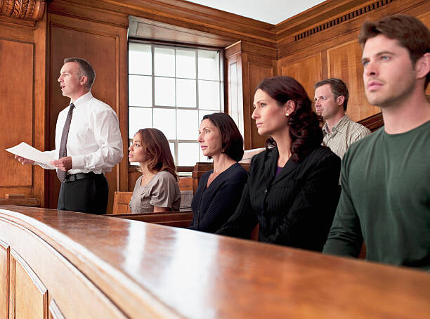 Umělecká fotografie Jury sitting in courtroom